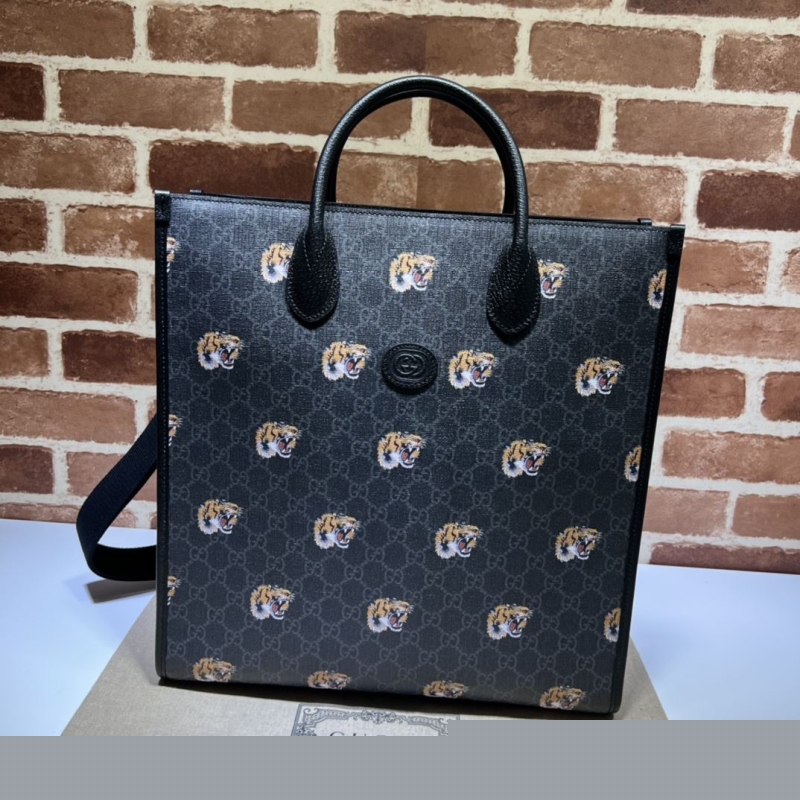 G*u*i shopping bags